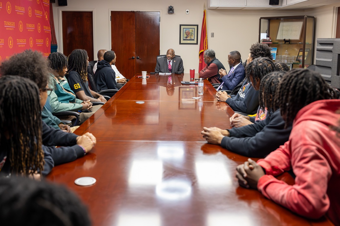 Dr Mark Brown meets with Men's Basketball Team