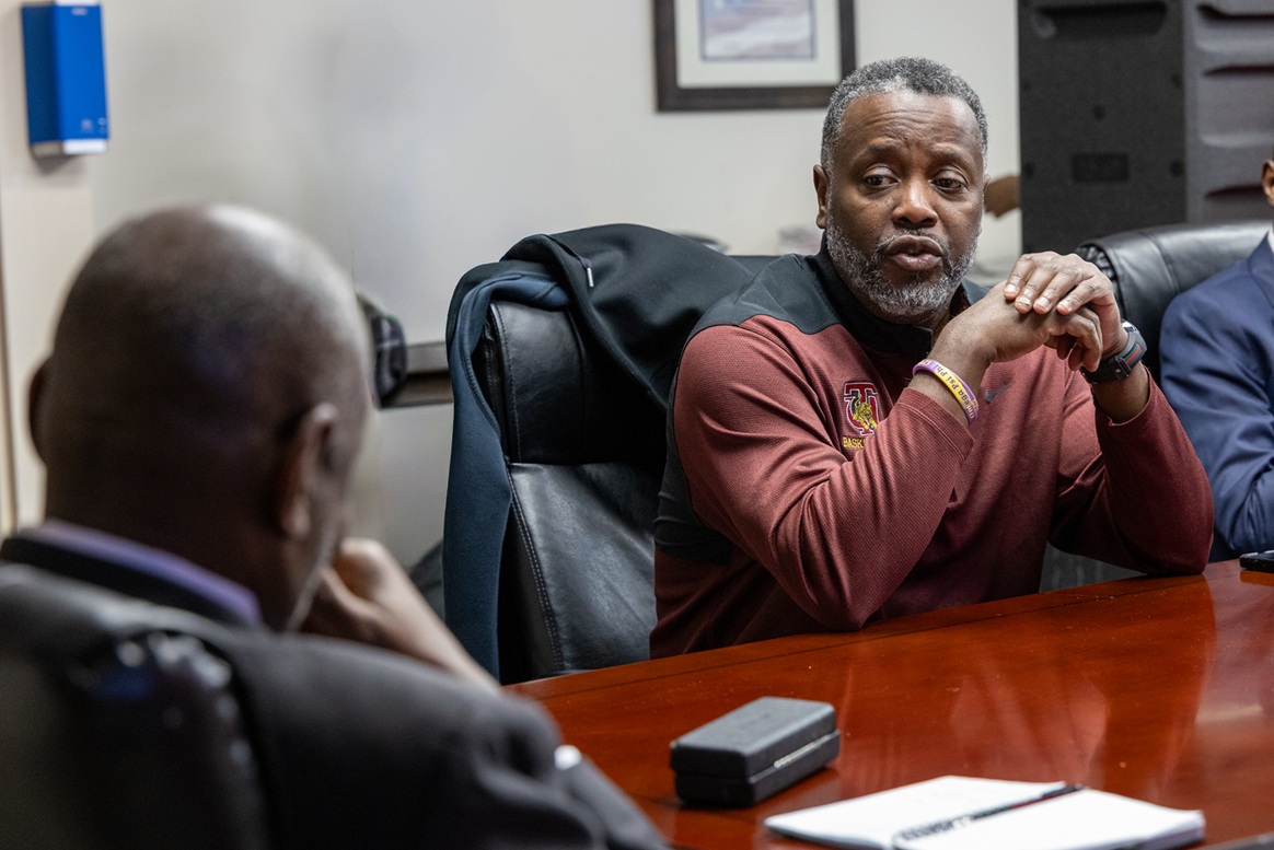 MBB Coach Benjy Taylor talking with President Brown