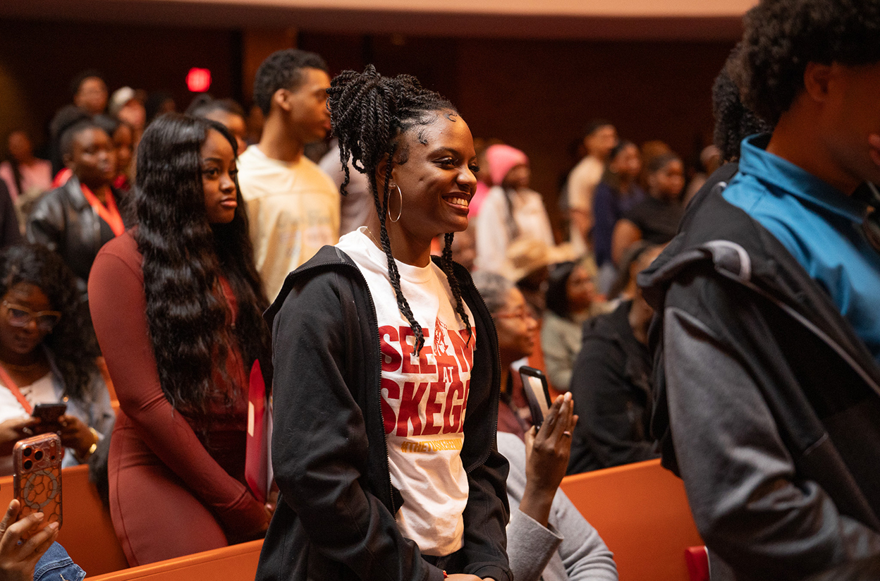 Students standing during ceremony in the Chapel