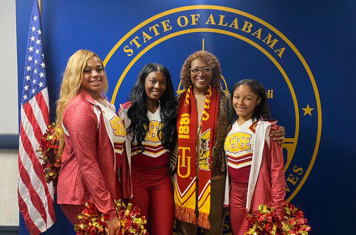 TU cheerleaders with Representative Pebblin Warren