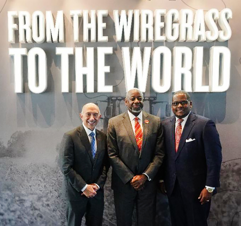 Dothan Mayor Mark Saliba, TU President & CEO Dr. Mark A. Brown, and TU alum Delvick McKay