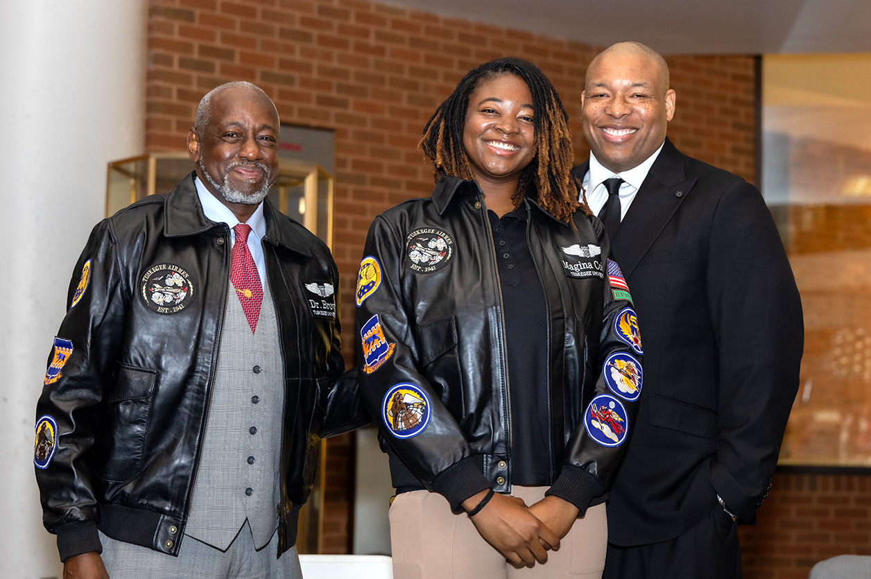 Dr. Brown and Capt. Sanders with a female aviation student