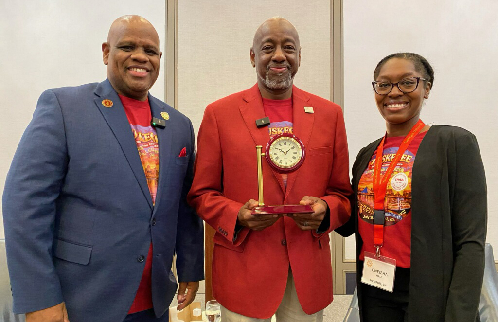 Dr. Quincy and Oneisha Hall, President, Memphis Tuskegee Alumni Club present token to Dr. Brown