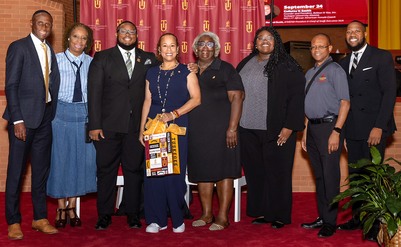 Group photo of Collette V. Smith and Tuskegee Lyceum team