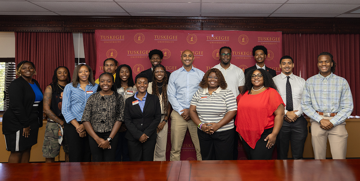 Rep. Shomari Figures and TU students take a group photo