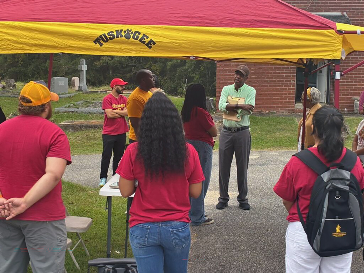 Group discussion at the cemetery