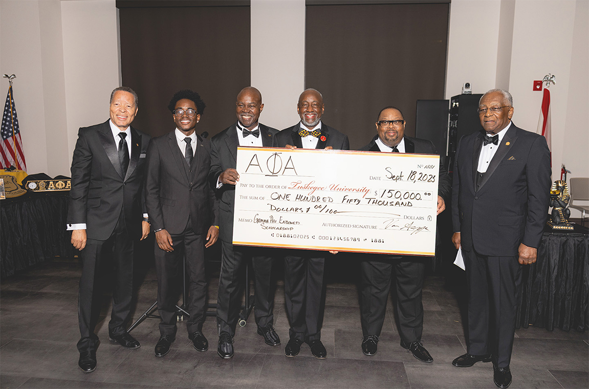 Alpha Fraternity check presentation to Tuskegee University
