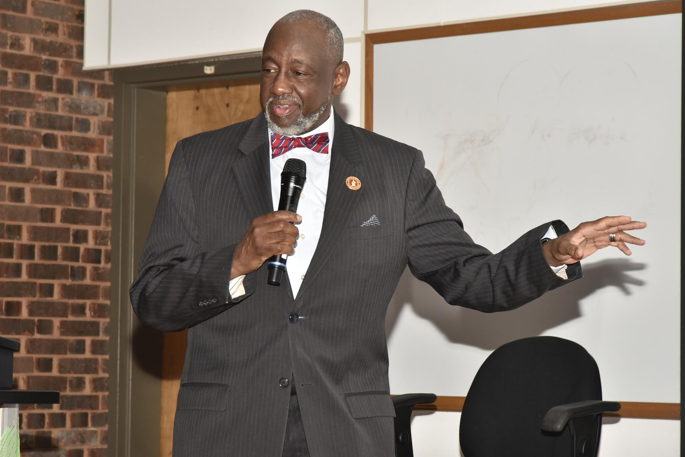 TU President Dr. Mark A. Brown brings greetings at Symposium