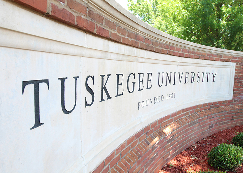 TU nameplate at front gate