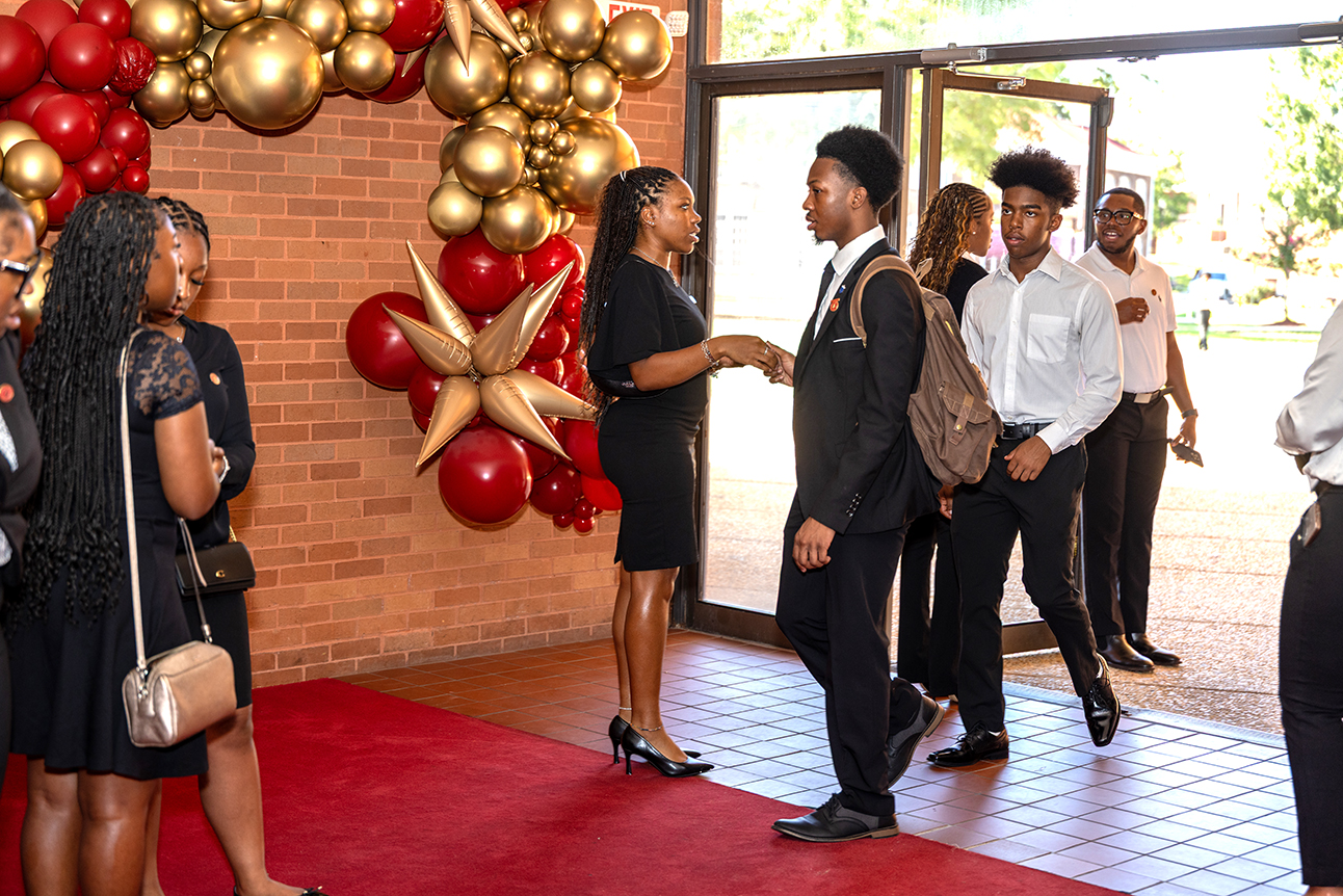 Student greeters at the Chapel door
